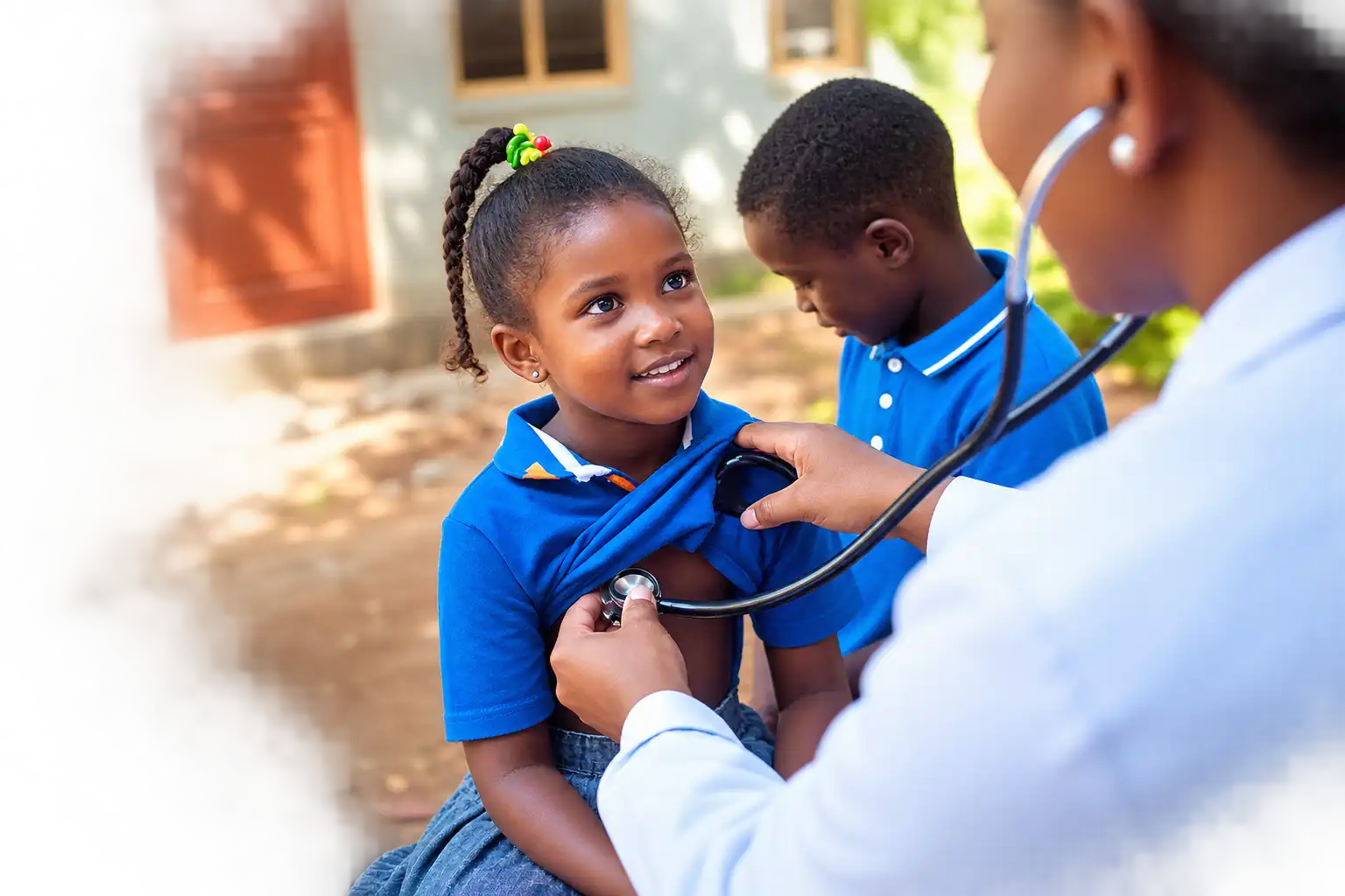 A HAAN health worker examining children in their community