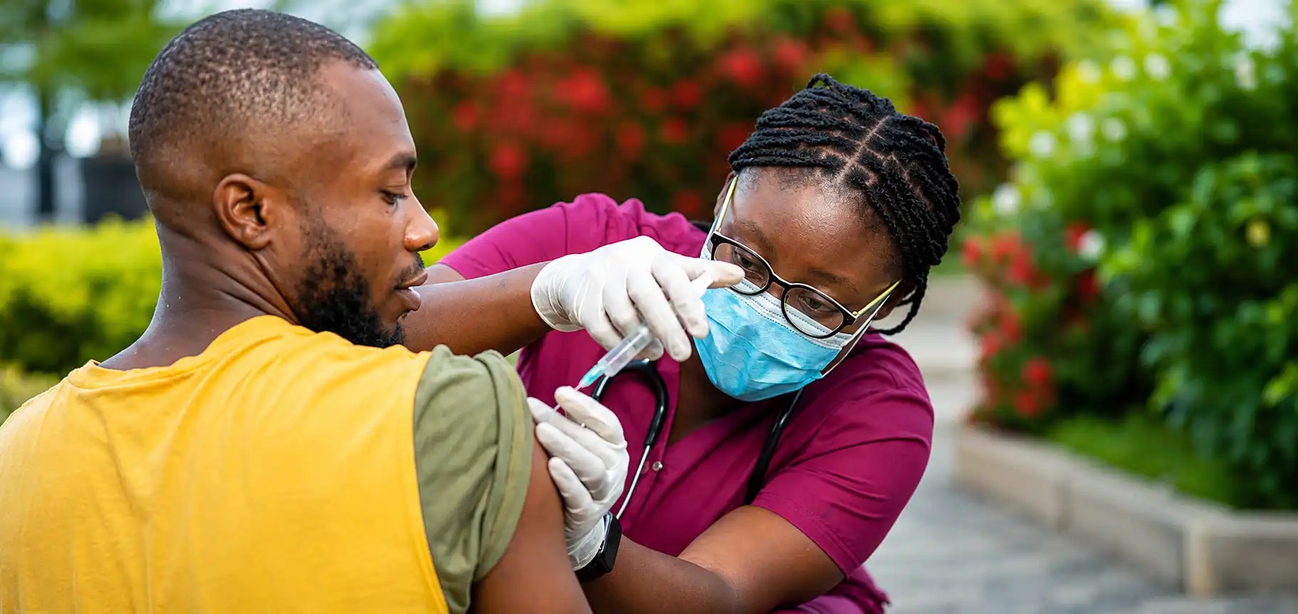 A health worker administering care in the community